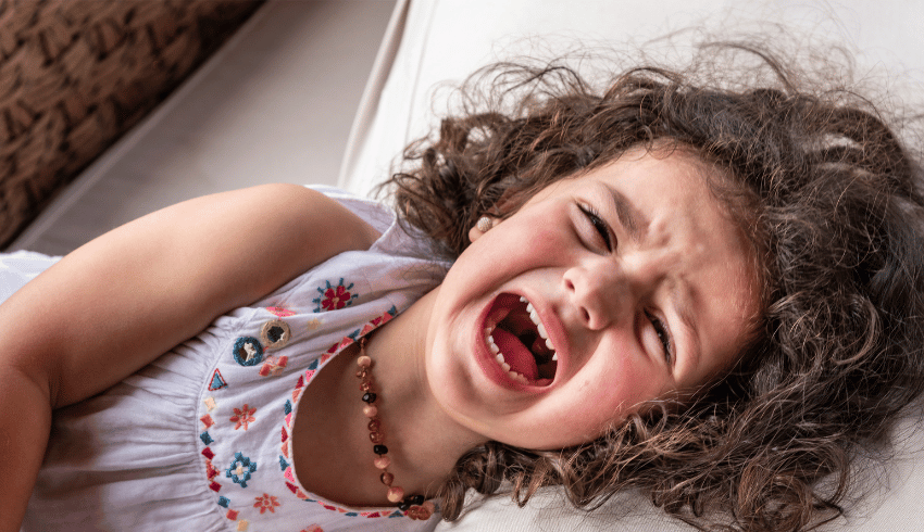 Girl having a tantrum, representing behaviour management in Early Years