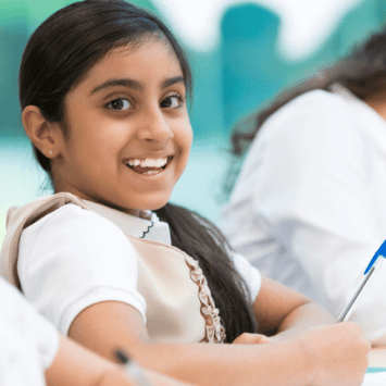 School children following Ashley Booth reading curriculum