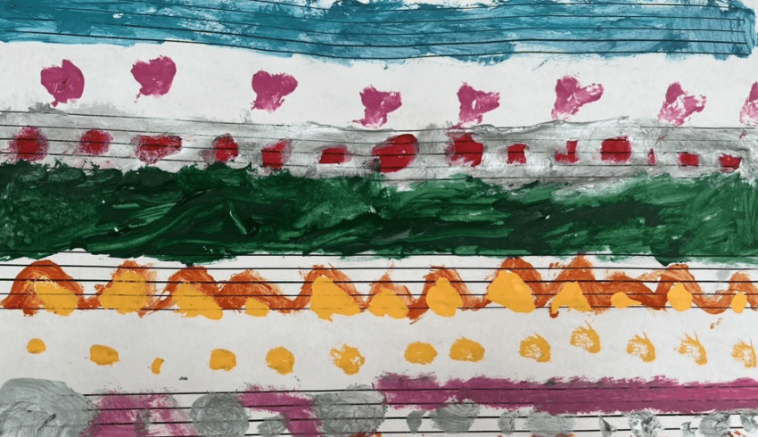 A child's painting on manuscript paper