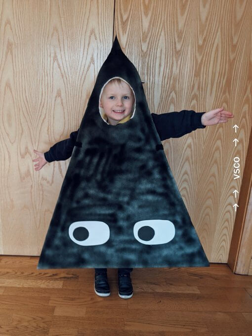 Boy in black triangle costume - World Book Day costume ideas