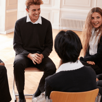 Teenagers in school uniform chatting, representing learning gap