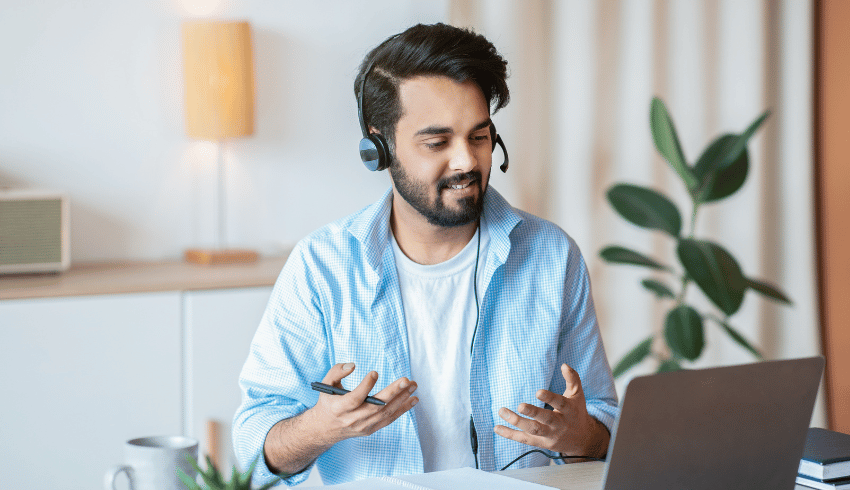 Male tutor with laptop, representing jobs for ex-teachers