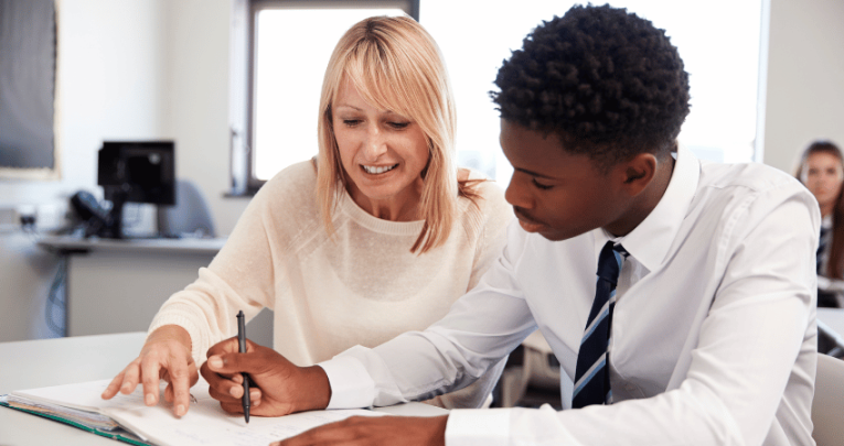 Schoolboy taking part in school led tutoring