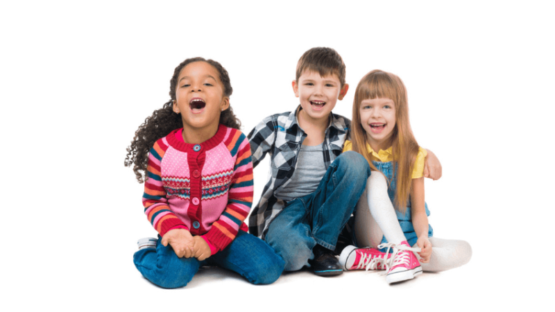 Three happy children, representing the idea of a neurodiversity champion