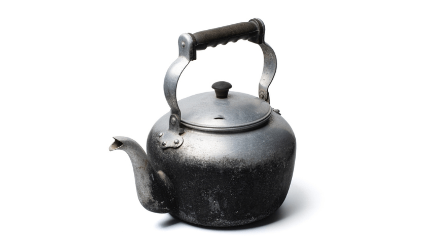 An old tin kettle, representing historical objects
