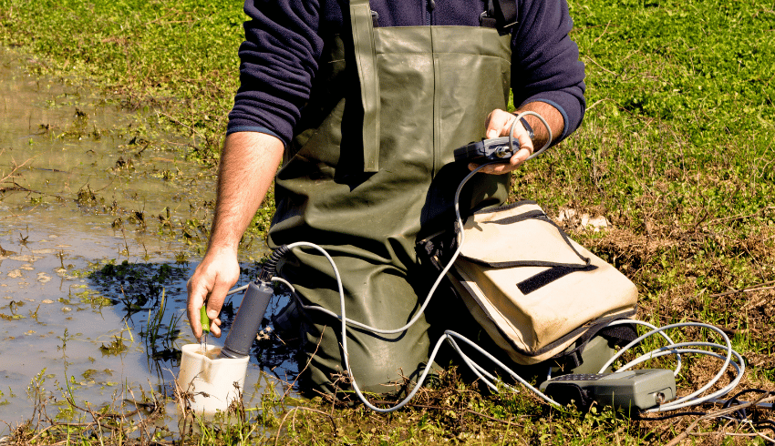 Man undertaking testing in a wet field, representing Green Careers Week
