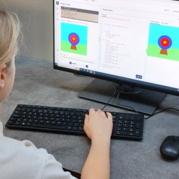 A schoolgirl working at a computer