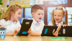 A group of primary school children using tablets