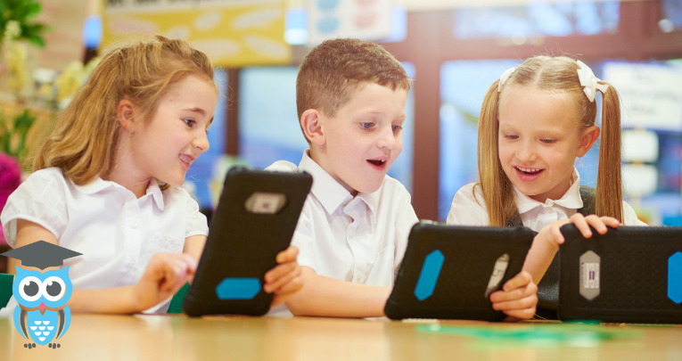 A group of primary school children using tablets