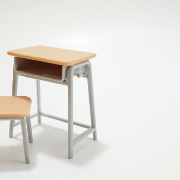 Desk and chair in empty seclusion room