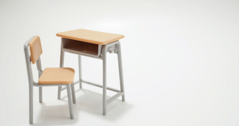 Desk and chair in empty seclusion room