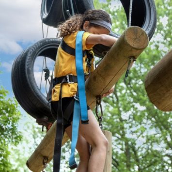 A girl on a high ropes course