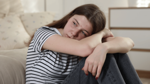 Stressed teenage girl, representing autistic burnout