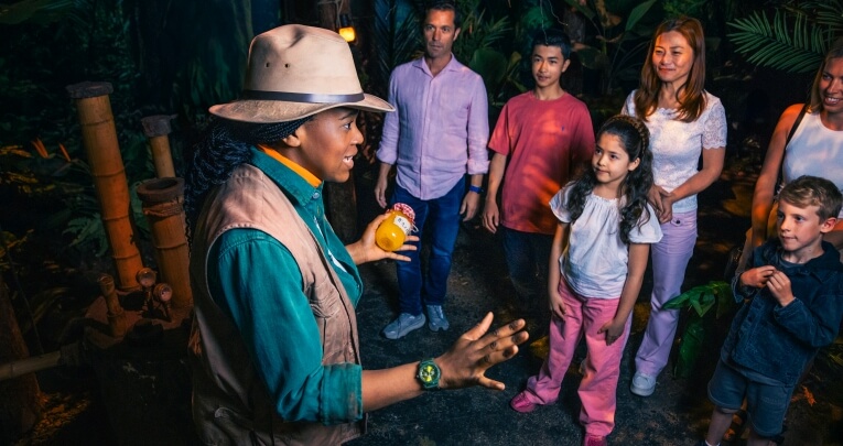 A group children with a guide at The Paddington Bear Experience