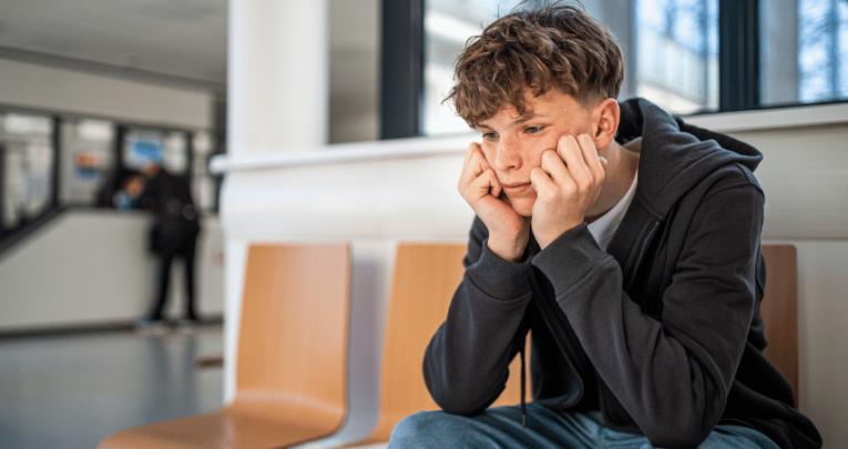 Teenager experiencing school trip anxiety