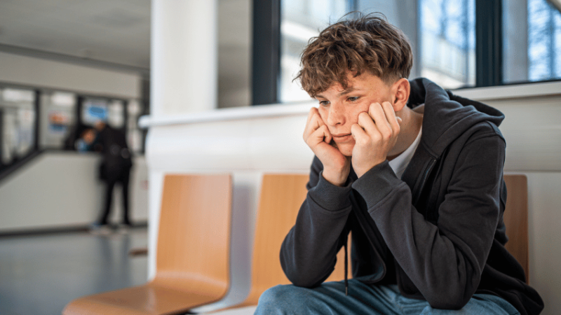 Teenager experiencing school trip anxiety