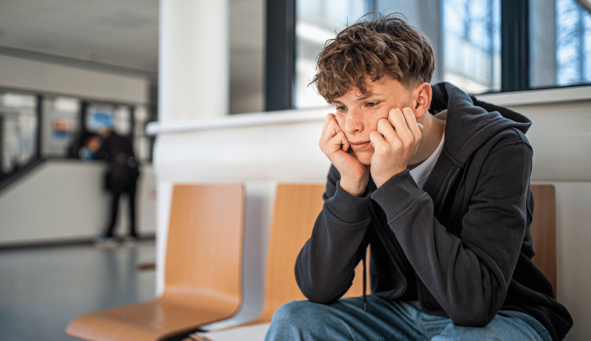Teenager experiencing school trip anxiety
