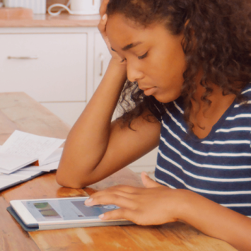 Year 11 girl revising at home