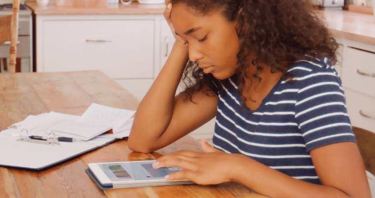 Year 11 girl revising at home