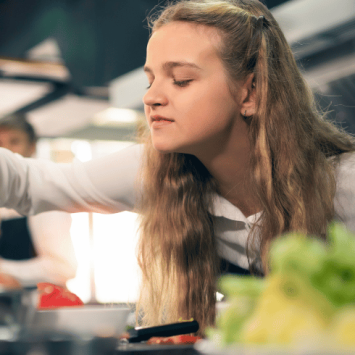 Girl taking part in food technology lesson