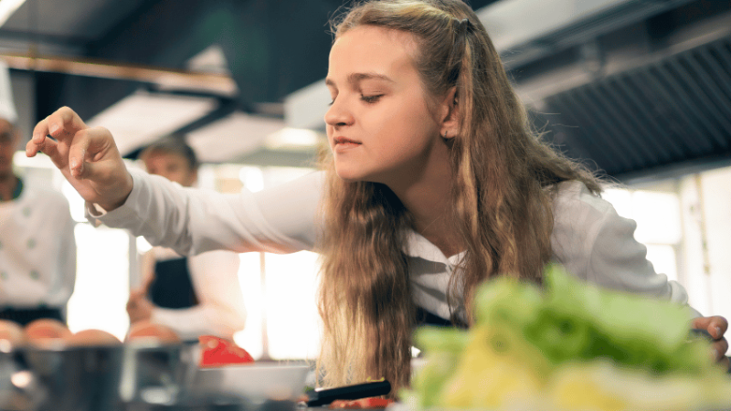 Girl taking part in food technology lesson