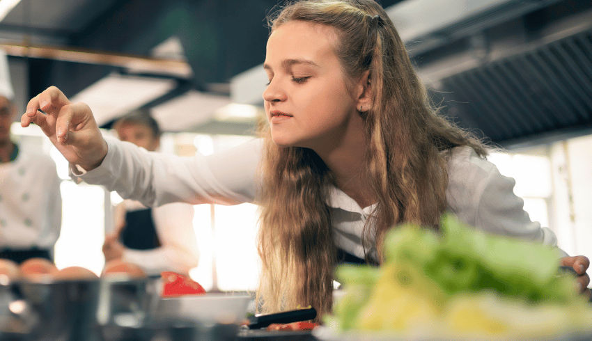 Girl taking part in food technology lesson