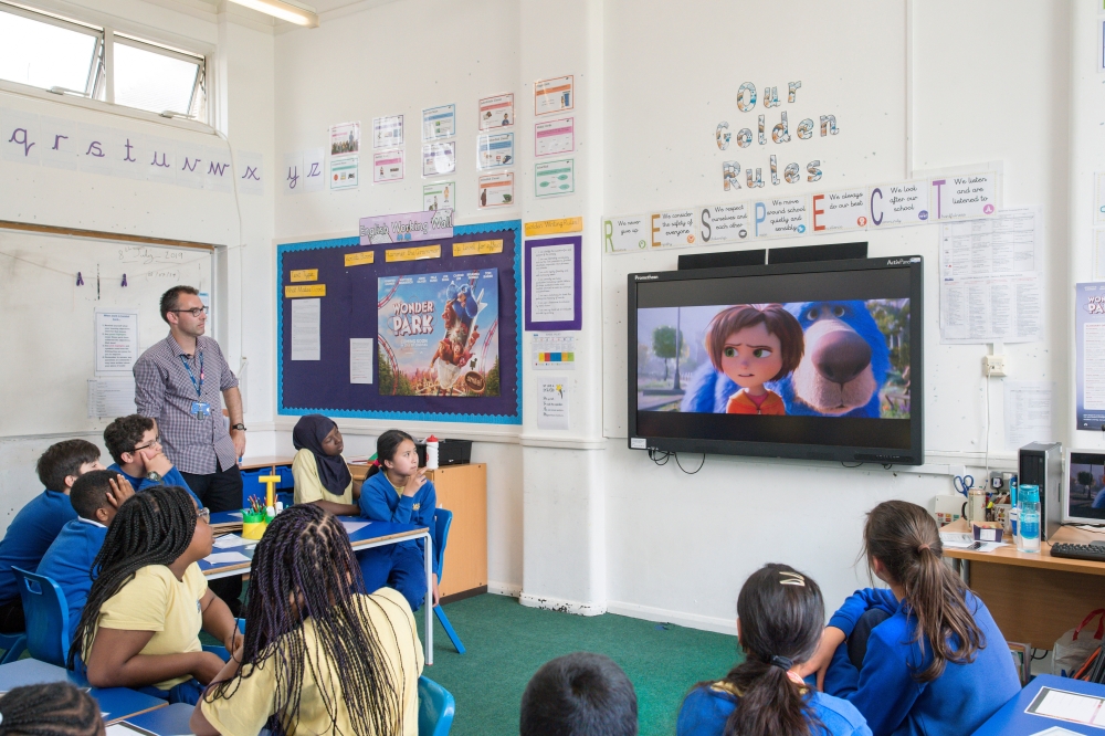 Pupils in a classroom using Into Film resources
