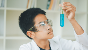 Male student doing triple science GCSE