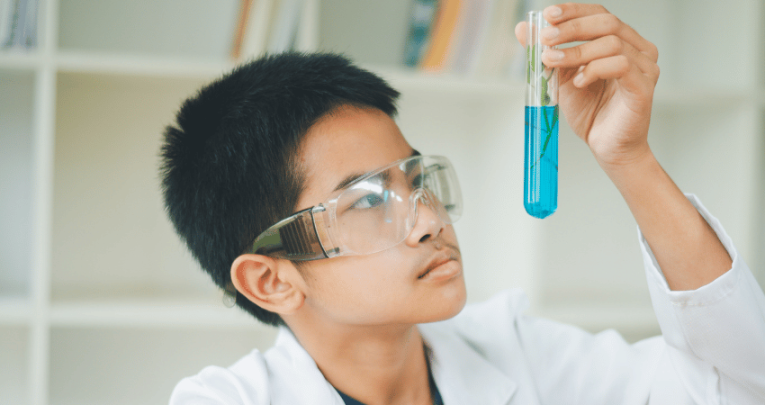 Male student doing triple science GCSE