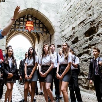 School pupils on a tour at Warwick Castle